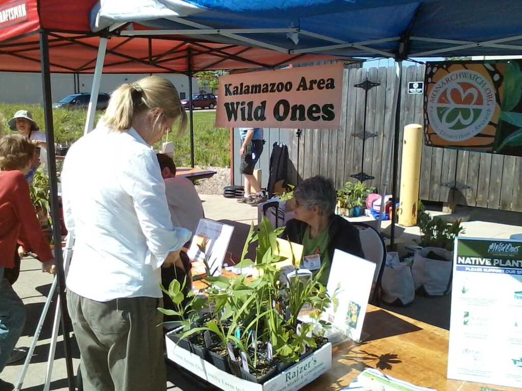 volunteers at information table