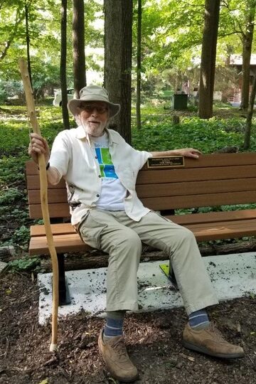 Tom Small sitting on park bench